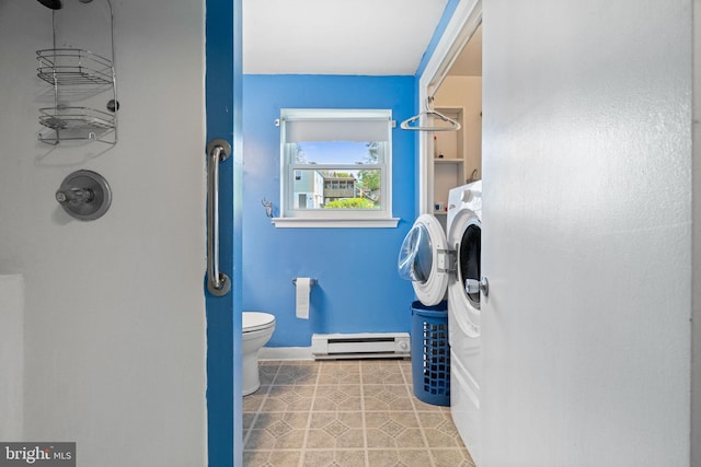 bathroom featuring baseboards, tile patterned flooring, a baseboard heating unit, and toilet