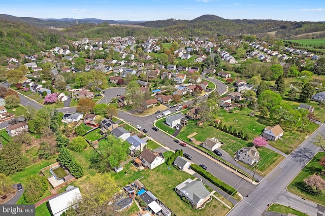 drone / aerial view with a residential view and a mountain view