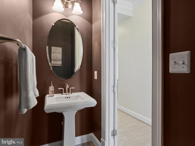 41909 Paddock Gate Pl, Ashburn, VA 20148 - bathroom with wood finished floors, baseboards, and a chandelier