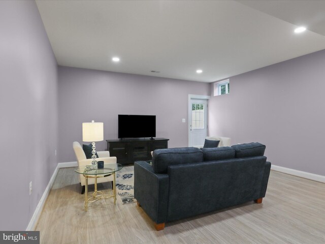 41909 Paddock Gate Pl, Ashburn, VA 20148 - living room with light wood-type flooring, baseboards, and recessed lighting