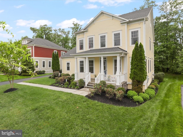 41909 Paddock Gate Pl, Ashburn, VA 20148 - view of front facade featuring a porch and a front yard