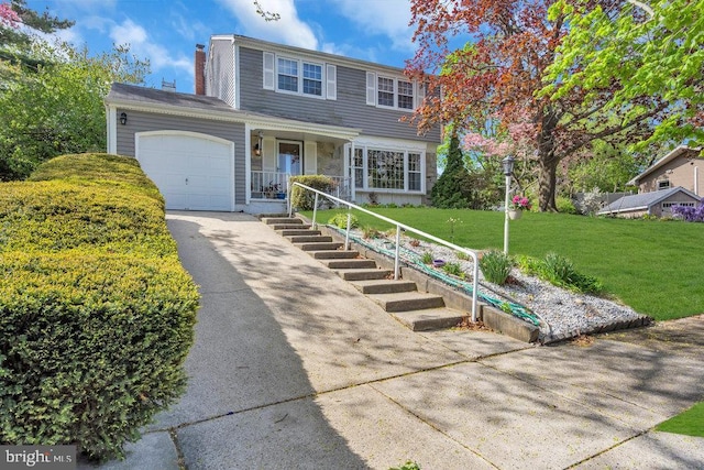 traditional-style home with a front lawn, aphalt driveway, stone siding, a chimney, and an attached garage