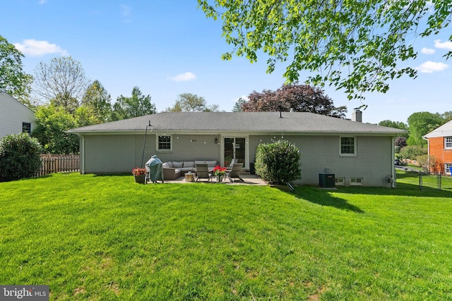 back of house with fence, a lawn, central AC unit, and an outdoor living space