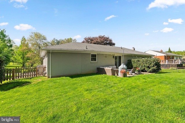 back of house featuring fence, a patio, an outdoor hangout area, and a yard