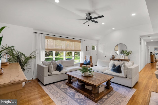 living room with recessed lighting, a ceiling fan, and lofted ceiling