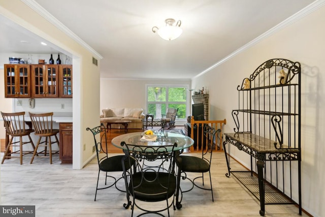 2602 Jeffrey Lori Dr, Finksburg, MD 21048 - dining space with light wood-style floors, visible vents, baseboards, and ornamental molding