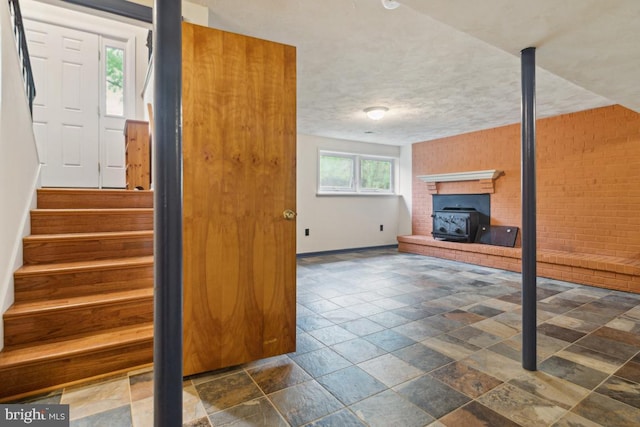 2602 Jeffrey Lori Dr, Finksburg, MD 21048 - staircase with a wood stove, baseboards, and stone tile flooring