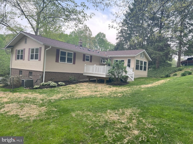 2602 Jeffrey Lori Dr, Finksburg, MD 21048 - rear view of property featuring central AC, a chimney, a lawn, fence, and a wooden deck