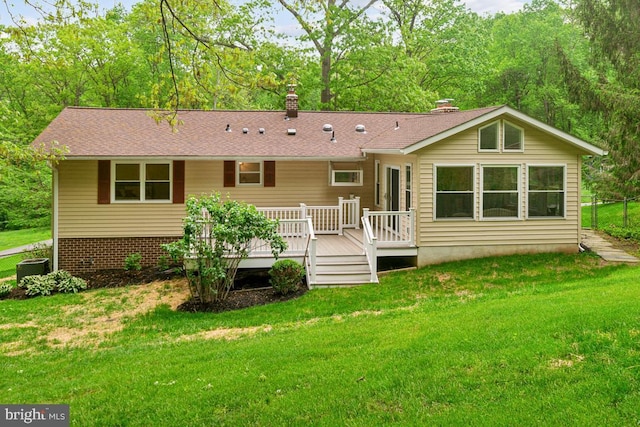 2602 Jeffrey Lori Dr, Finksburg, MD 21048 - back of property with a yard, a chimney, and a wooden deck