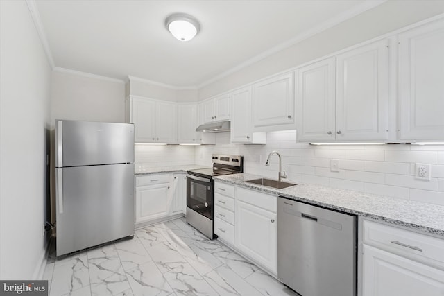 kitchen featuring crown molding, appliances with stainless steel finishes, a sink, white cabinetry, and under cabinet range hood