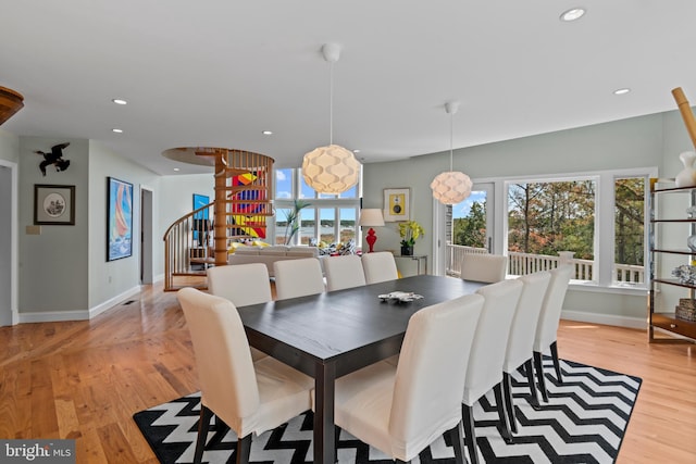 5419 Ragged Point Rd, Cambridge, MD 21613 - dining space with stairway, baseboards, light wood-style floors, and recessed lighting