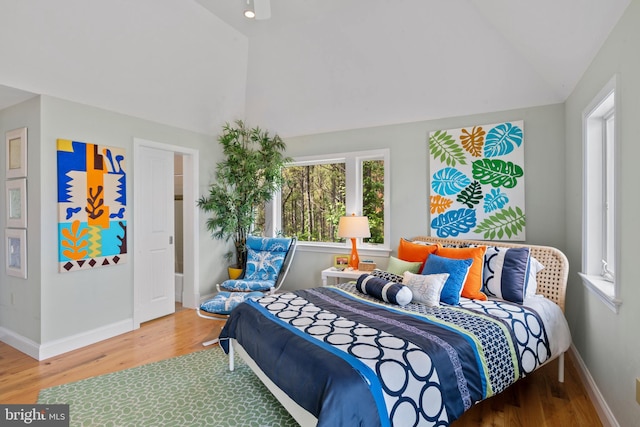 5419 Ragged Point Rd, Cambridge, MD 21613 - bedroom featuring wood finished floors, baseboards, and high vaulted ceiling