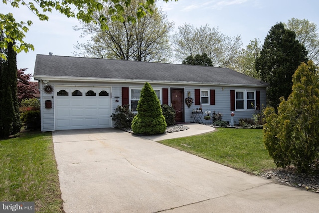 216 Laurel Ct, Pine Grove, PA 17963 - ranch-style house featuring concrete driveway, an attached garage, and a front yard