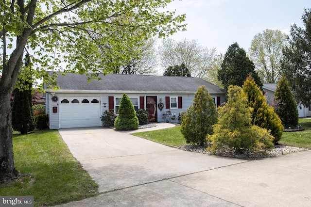 216 Laurel Ct, Pine Grove, PA 17963 - ranch-style house with an attached garage, concrete driveway, and a front lawn