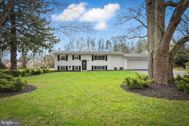 2725 Baublitz Rd, Owings Mills, MD 21117 - bi-level home with a garage, driveway, and a front lawn