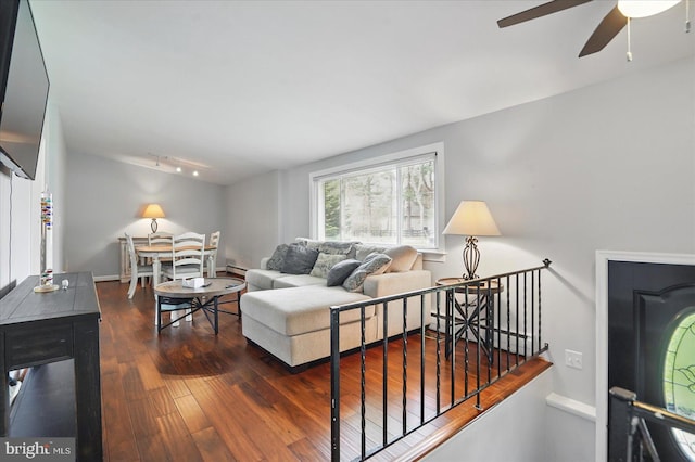 2725 Baublitz Rd, Owings Mills, MD 21117 - living room with wood finished floors, baseboards, ceiling fan, a baseboard heating unit, and rail lighting