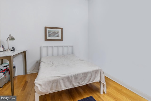 2200 Arch St Unit 514, Philadelphia, PA 19103 - bedroom with baseboards and wood finished floors