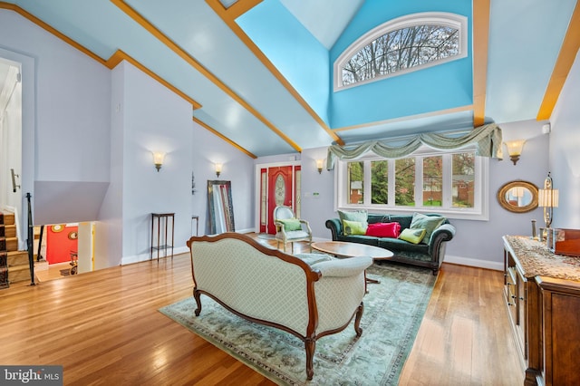 1110 Brantford Ave, Silver Spring, MD 20904 - living area with stairway, high vaulted ceiling, baseboards, and hardwood / wood-style flooring