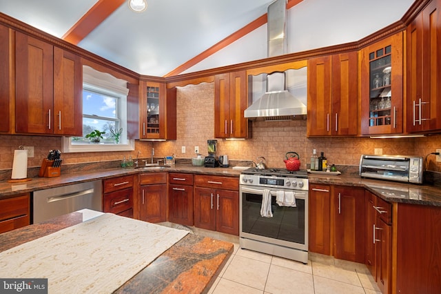 1110 Brantford Ave, Silver Spring, MD 20904 - kitchen featuring appliances with stainless steel finishes, wall chimney exhaust hood, light tile patterned floors, lofted ceiling, and a toaster