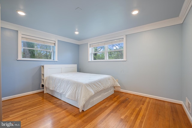 1110 Brantford Ave, Silver Spring, MD 20904 - bedroom with crown molding, baseboards, and wood finished floors