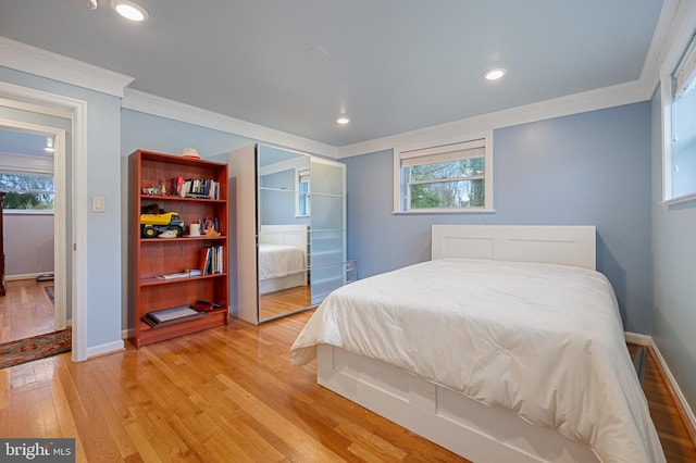 1110 Brantford Ave, Silver Spring, MD 20904 - bedroom featuring baseboards, ornamental molding, light wood finished floors, and multiple windows