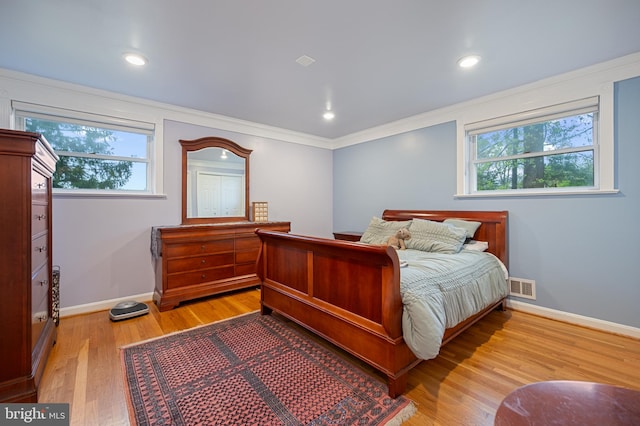 1110 Brantford Ave, Silver Spring, MD 20904 - bedroom featuring visible vents, crown molding, wood finished floors, and multiple windows