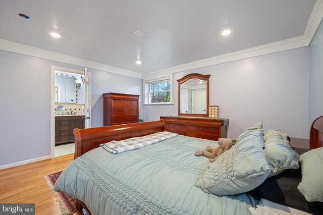 1110 Brantford Ave, Silver Spring, MD 20904 - bedroom with crown molding, recessed lighting, and light wood finished floors
