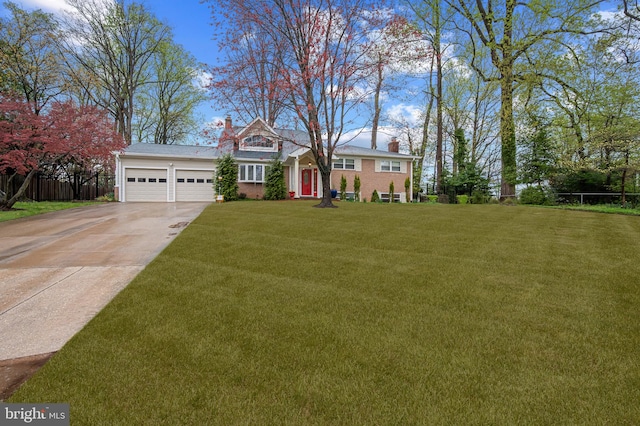 1110 Brantford Ave, Silver Spring, MD 20904 - view of front of home with a front lawn, fence, a chimney, concrete driveway, and an attached garage