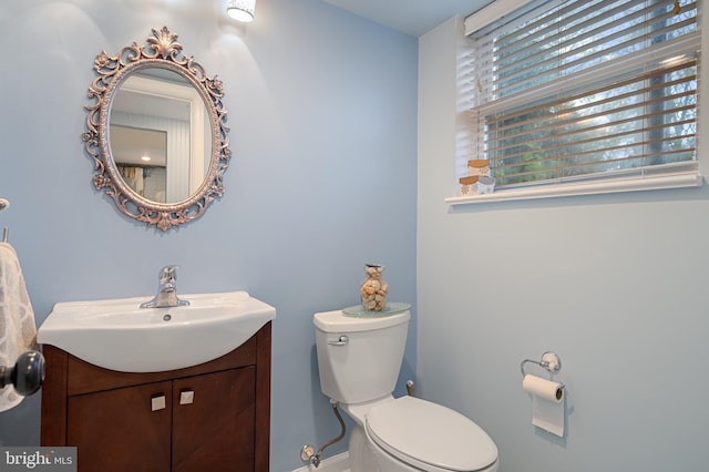 1110 Brantford Ave, Silver Spring, MD 20904 - half bathroom with vanity, baseboards, and toilet
