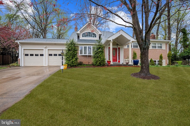 1110 Brantford Ave, Silver Spring, MD 20904 - view of front facade featuring brick siding, a garage, a front yard, a chimney, and concrete driveway