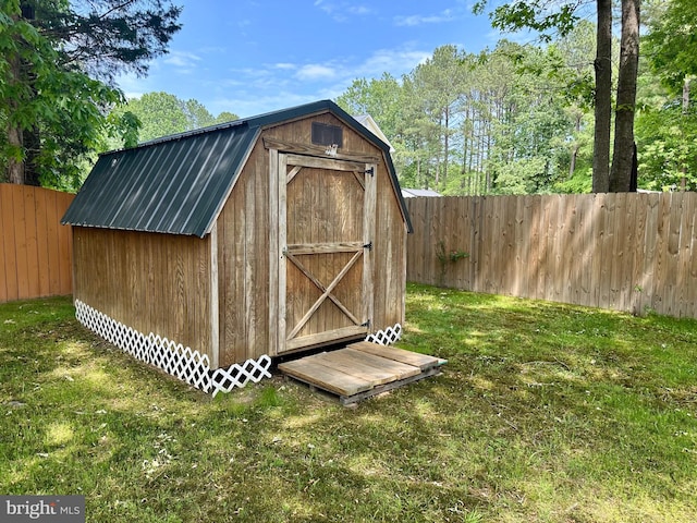 view of shed featuring a fenced backyard