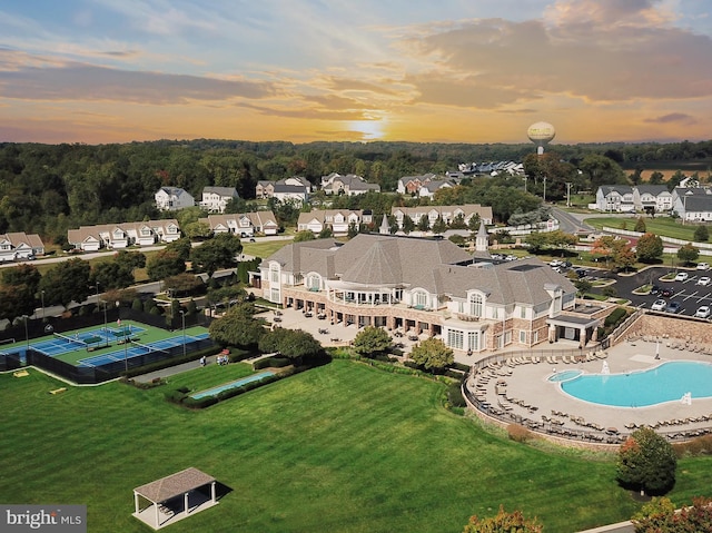 aerial view at dusk with a residential view