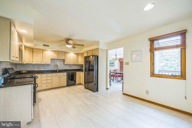 13 Elena Ct, Voorhees, NJ 08043 - kitchen featuring visible vents, a sink, ceiling fan with notable chandelier, backsplash, and black appliances