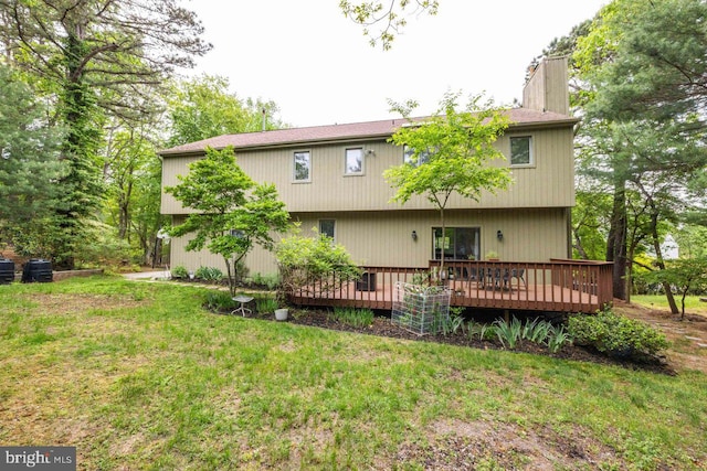 13 Elena Ct, Voorhees, NJ 08043 - rear view of property with a yard, a deck, and a chimney