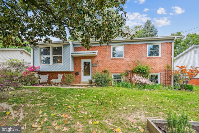 2409 Hayden Dr, Silver Spring, MD 20902 - raised ranch with brick siding and a front lawn