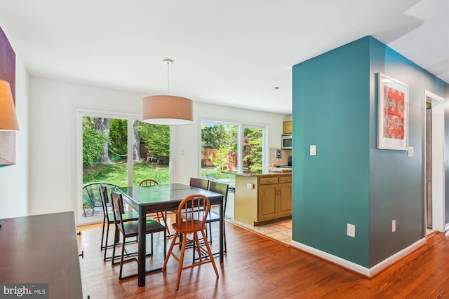 2409 Hayden Dr, Silver Spring, MD 20902 - dining space with light wood finished floors and baseboards