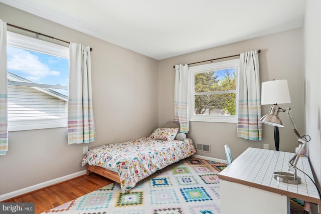 2409 Hayden Dr, Silver Spring, MD 20902 - bedroom featuring baseboards and wood finished floors