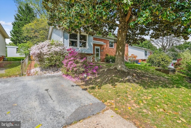 2409 Hayden Dr, Silver Spring, MD 20902 - view of front of property with fence and brick siding
