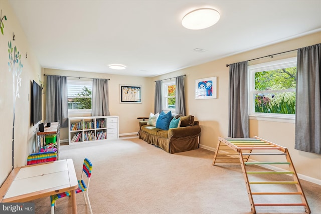 2409 Hayden Dr, Silver Spring, MD 20902 - living area with healthy amount of natural light, baseboards, and carpet floors