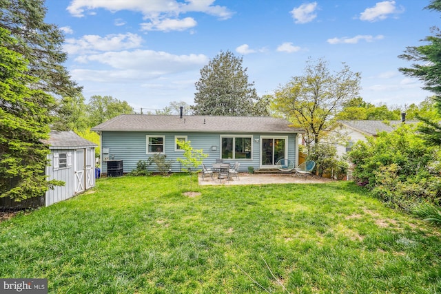2409 Hayden Dr, Silver Spring, MD 20902 - rear view of house featuring a patio, a shed, a yard, an outdoor structure, and central AC unit