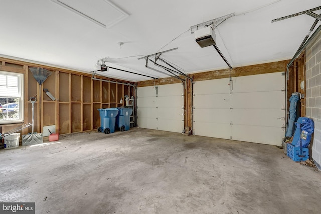 garage featuring a garage door opener