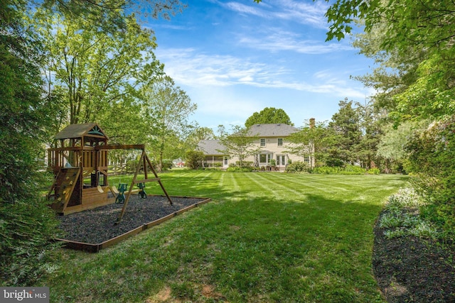 view of yard with a playground