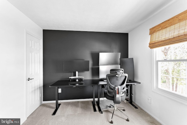 home office with baseboards and carpet flooring