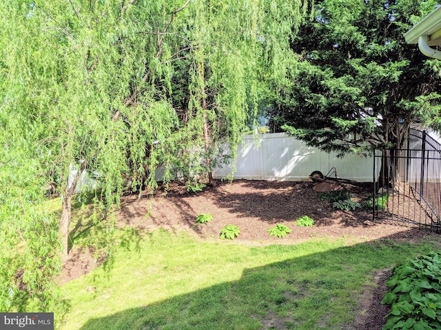view of yard with fence