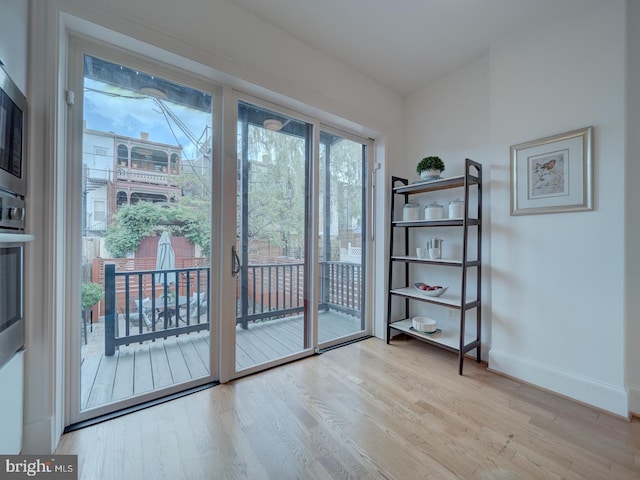 27 Seaton Pl NW, Washington, DC 20001 - entryway with baseboards and wood finished floors
