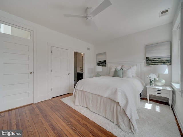 27 Seaton Pl NW, Washington, DC 20001 - bedroom with visible vents, ceiling fan, and hardwood / wood-style flooring