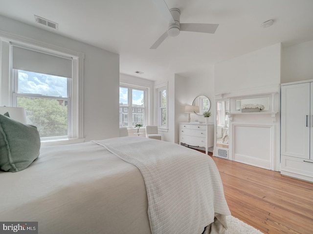 27 Seaton Pl NW, Washington, DC 20001 - bedroom with ceiling fan, light wood-style flooring, and visible vents