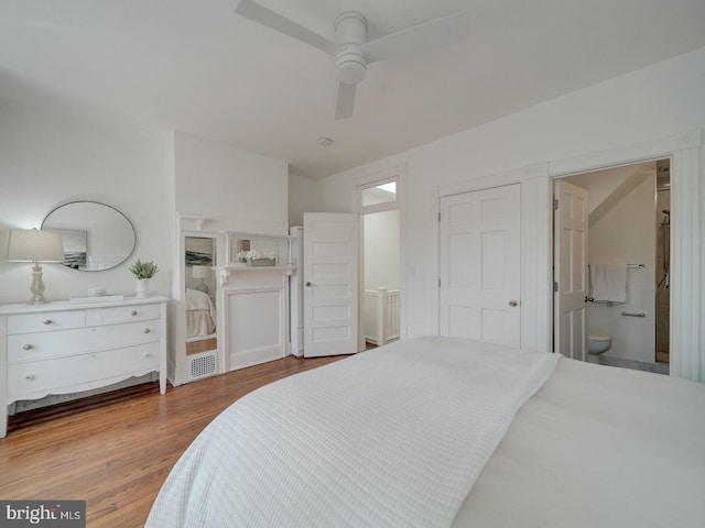 27 Seaton Pl NW, Washington, DC 20001 - bedroom featuring ceiling fan, ensuite bath, and wood finished floors