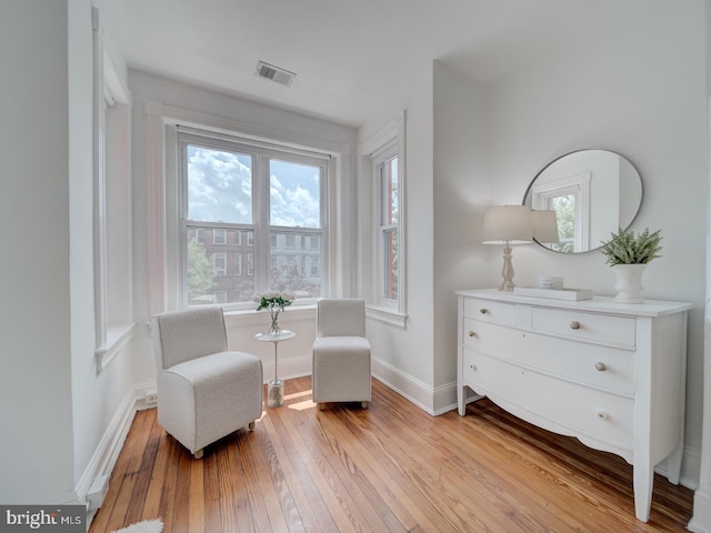27 Seaton Pl NW, Washington, DC 20001 - living area featuring baseboards, visible vents, and light wood-style floors