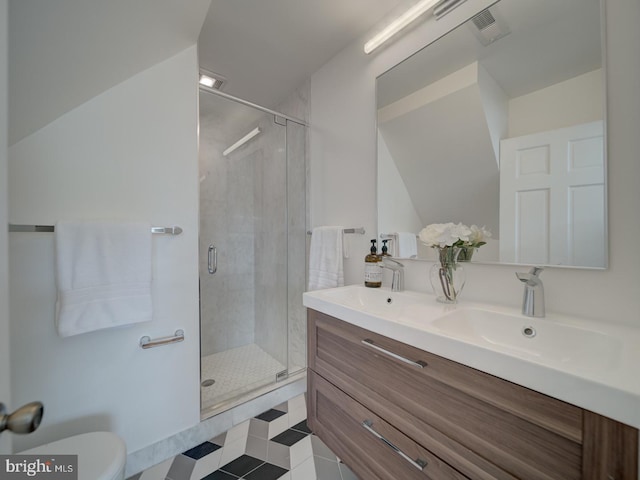 27 Seaton Pl NW, Washington, DC 20001 - full bathroom featuring double vanity, a sink, a stall shower, and toilet